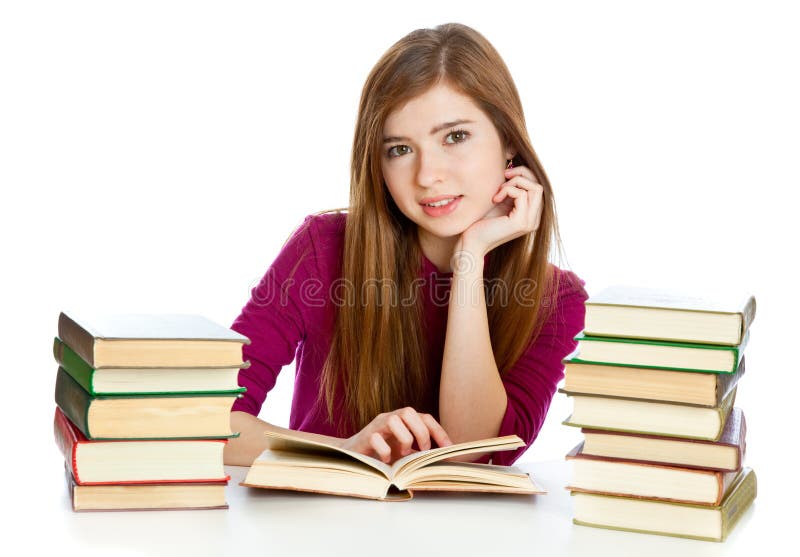 Girl sitting at the desk and reading book