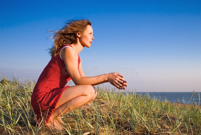 Girl sitting on a dune-4