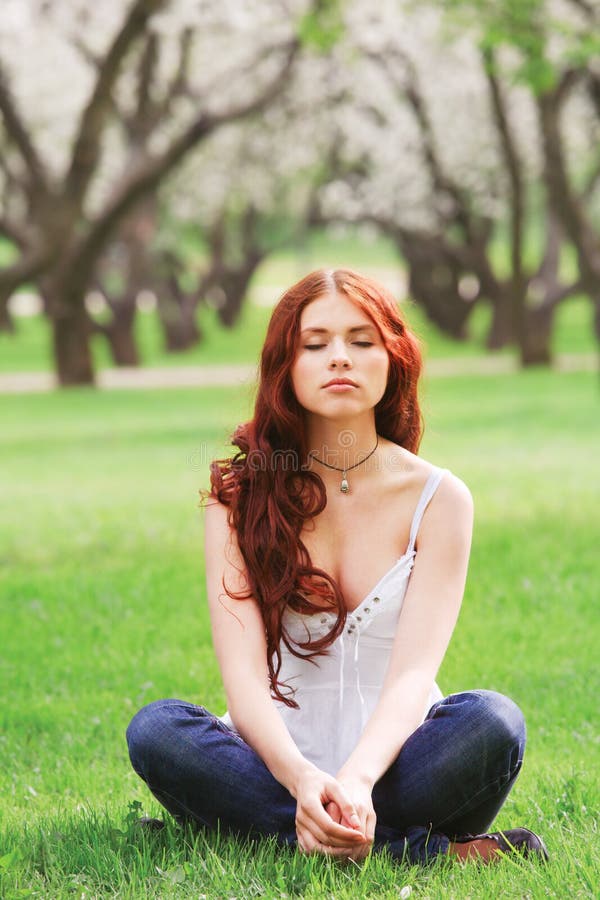 Girl sitting in the garden