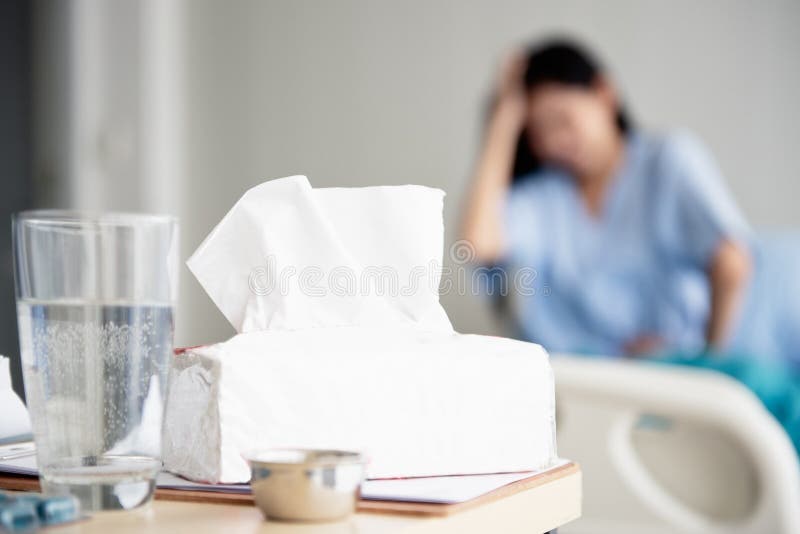 Women an ill in the hospital. Achoo, flu season