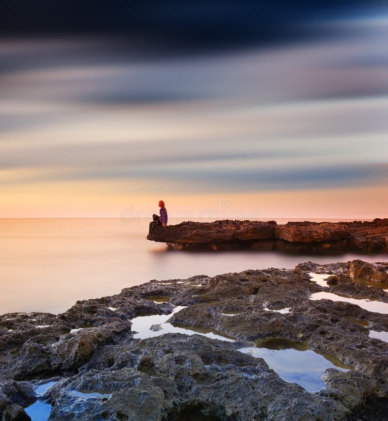 Woman on the rock