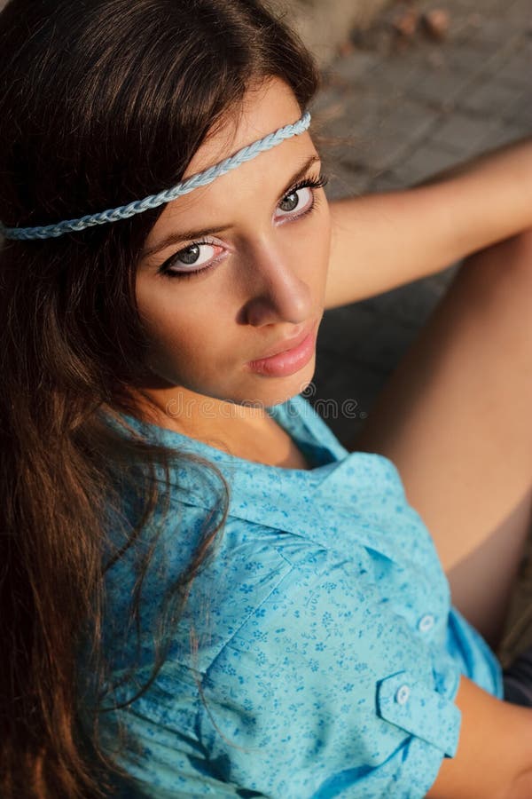 Girl sitting on stair