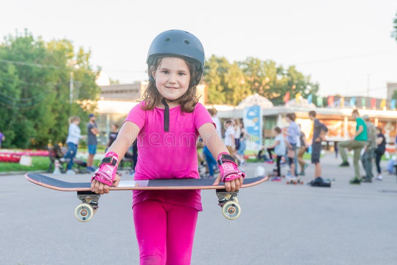 Girl skateboarding on natural background royalty free stock photos Girl skateboarding on natural background royalty free stock photos