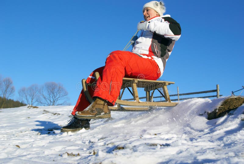 Girl on sledge