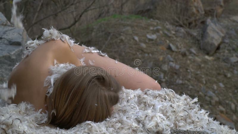 The Girl is Sleeping on Feathers in the Middle of the Forest Stock Footage - Video of backgrounds, elegance: 90549630