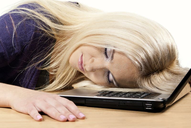 Girl sleeps on a laptop