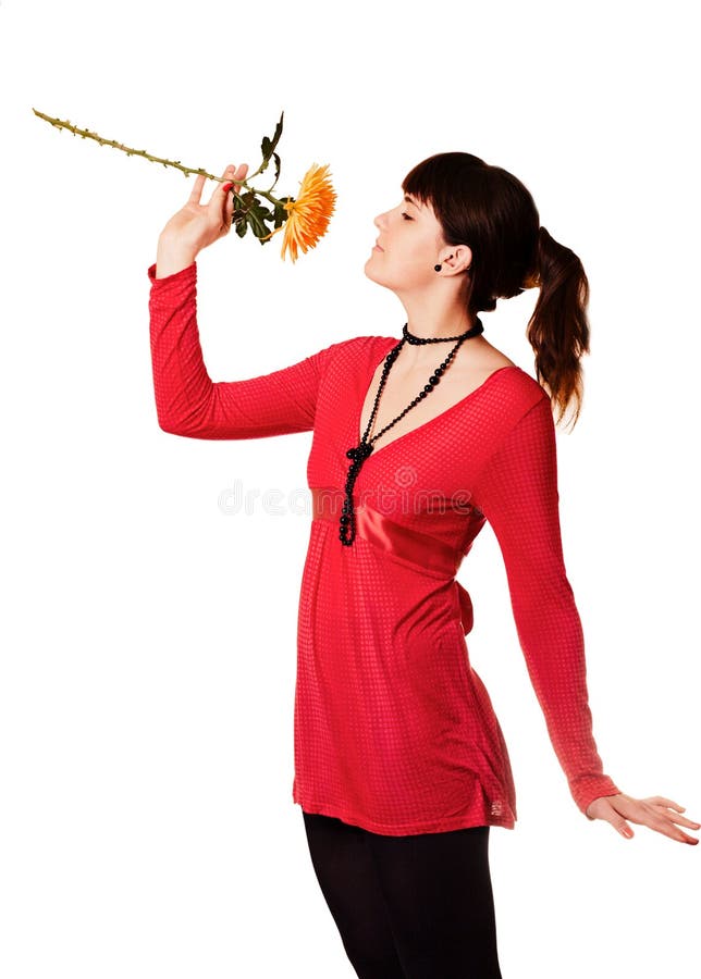 Girl smelling a flower