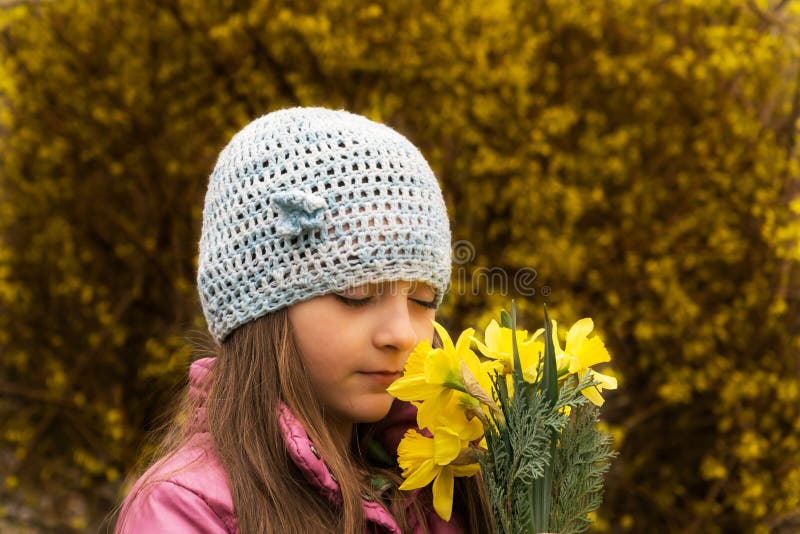 Girl Smells Flowers of Yellow Daffodils Stock Image Image of