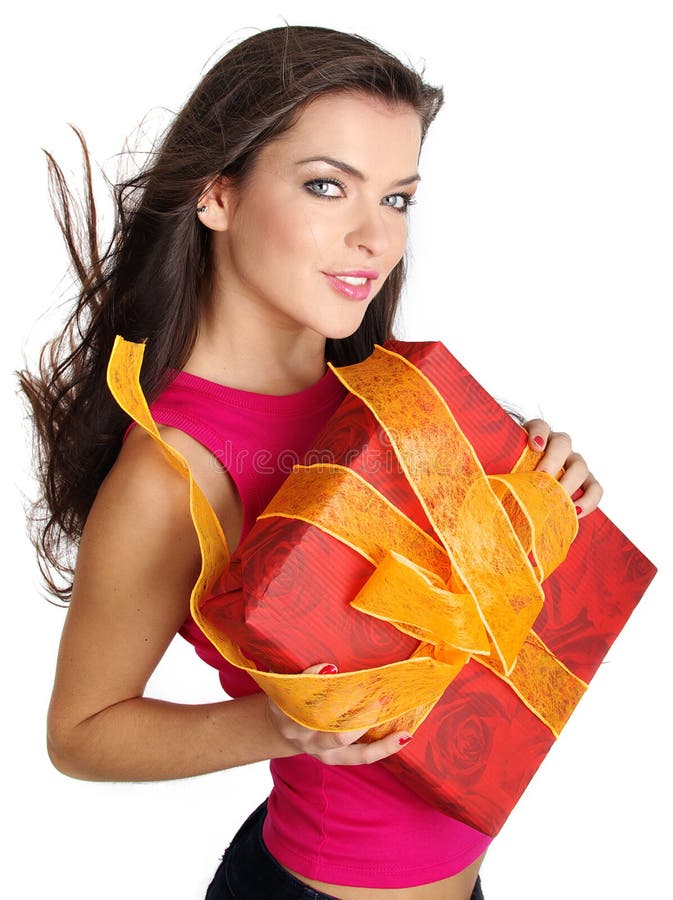 Girl smiles and holding a gift box