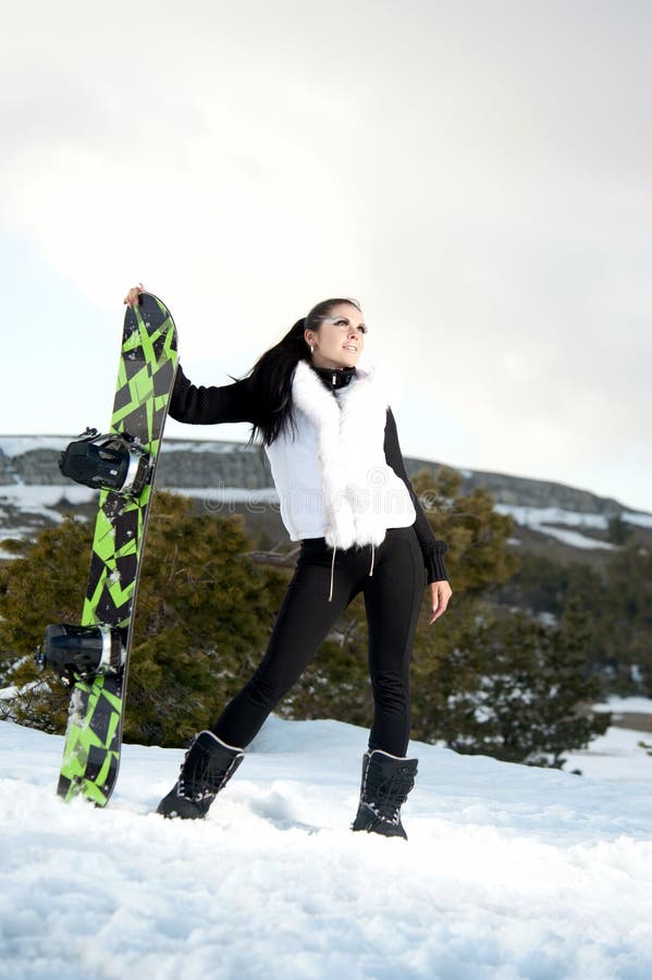 Girl with snowboard