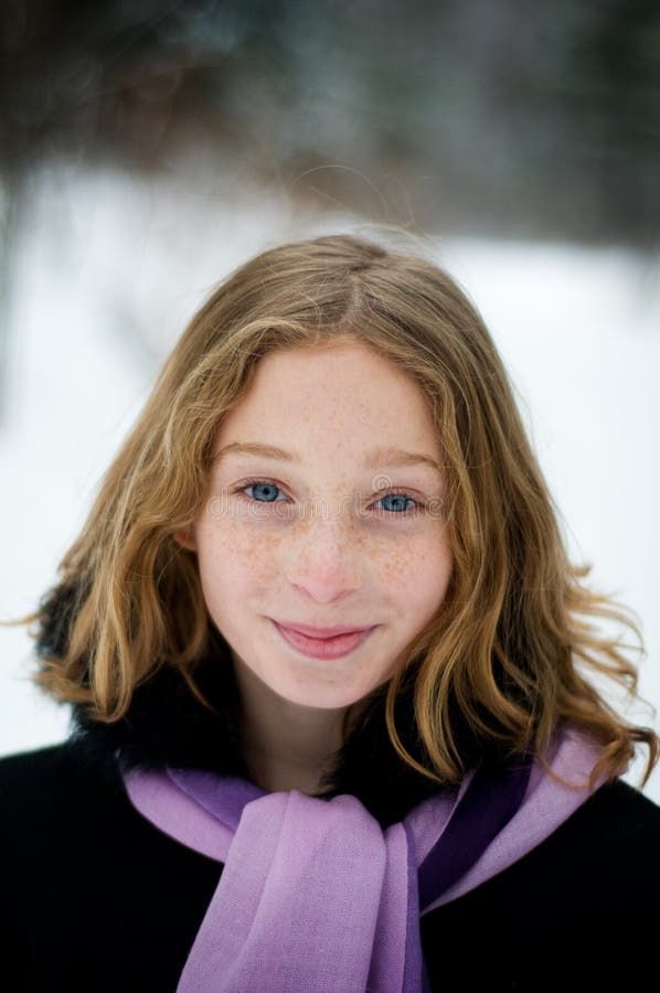 Girl in a snowy forest