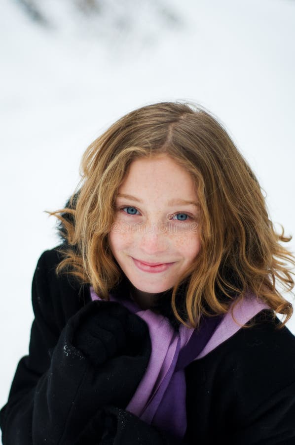 Girl in a snowy forest