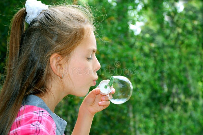 Girl with soap-bubbles