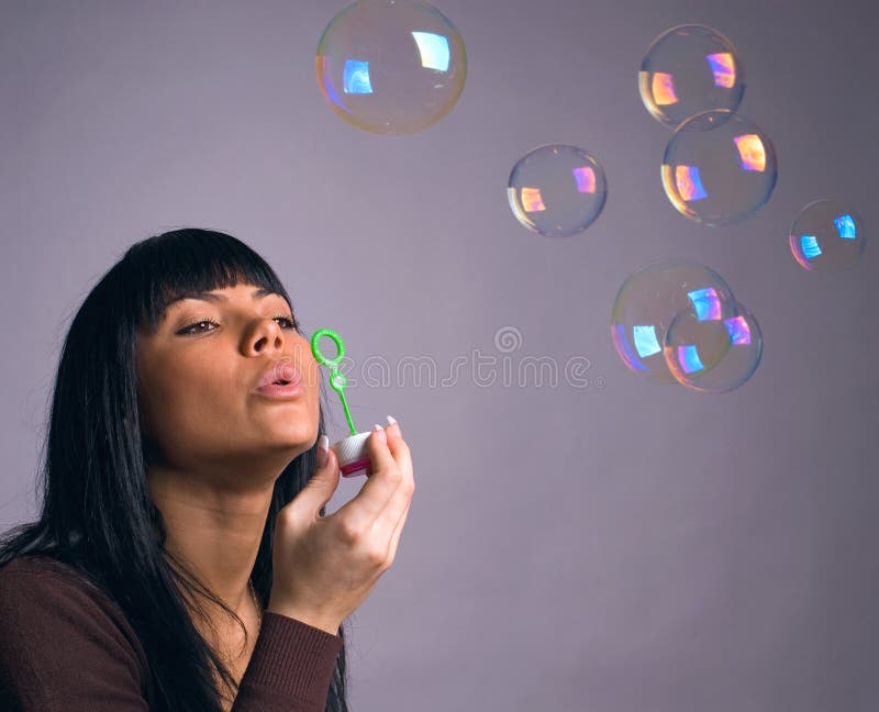 The girl and soap bubbles