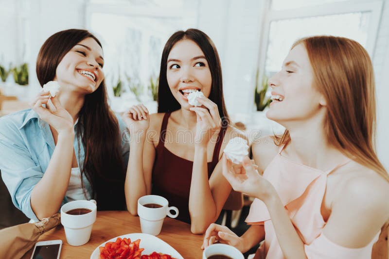 Girl spend Time Together with Tea and Biscuit. Yong Girl spend Time Together. Happiness and Good Time. Beautiful Girl Celebrate 8 Marth with Biscuit. Sensual royalty free stock photography Girl spend Time Together with Tea and Biscuit. Yong Girl spend Time Together. Happiness and Good Time. Beautiful Girl Celebrate 8 Marth with Biscuit. Sensual royalty free stock photography