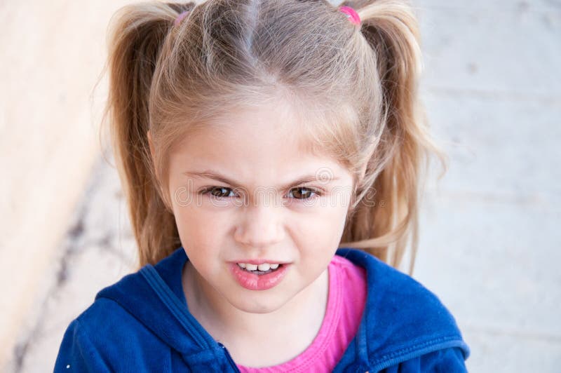 Girl squinting eyes stock photo. Image of blonde, pretty 39873570