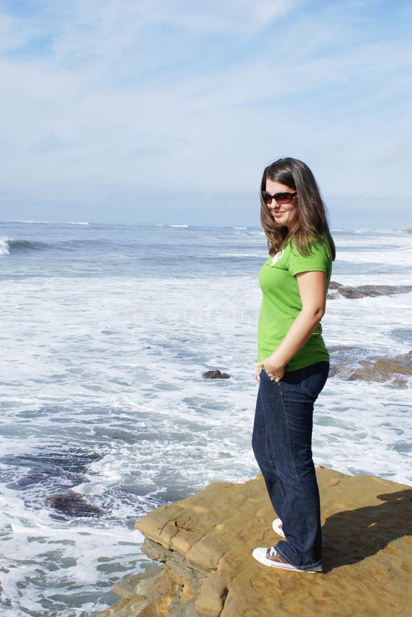 Girl Standing on Cliff at Ocean Stock Image Image of cliff, active