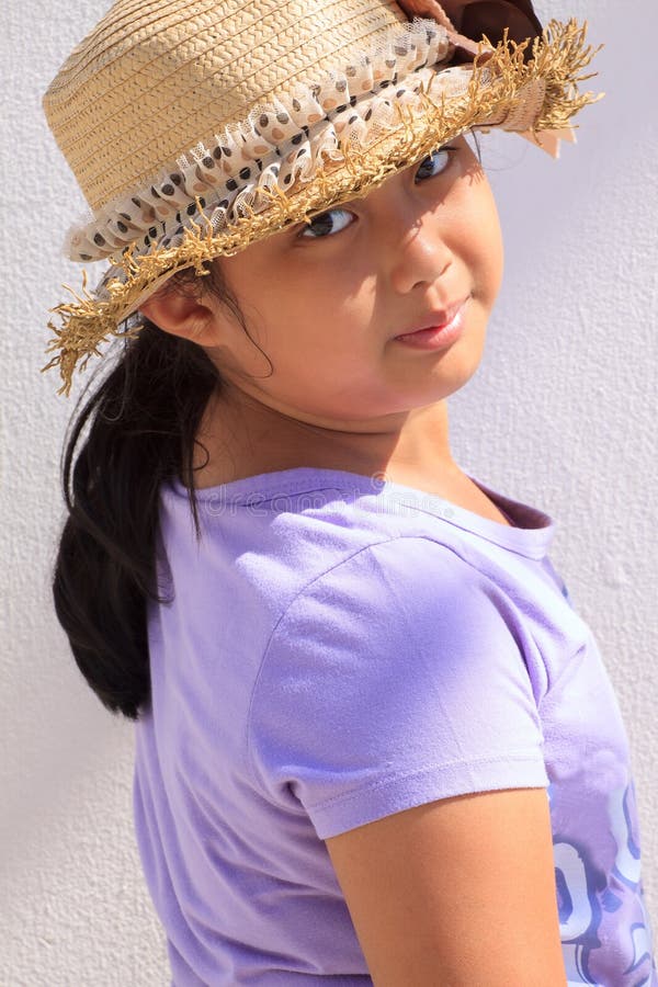 Girl and straw hat stock image. Image of closeup, beautiful 24505585