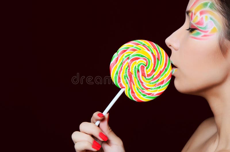 The Girl with a Sugar Candy Stock Image - Image of bite, background ...