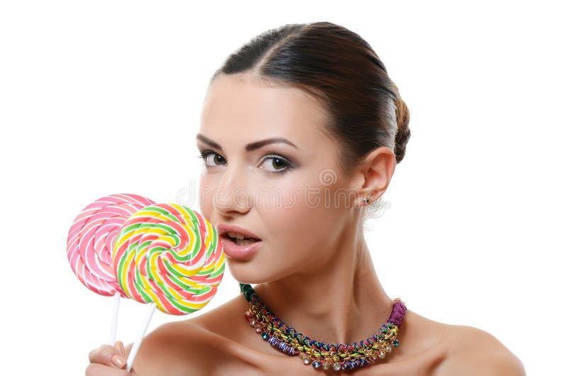 The girl with sugar candy stock photo. Image of face 34161846