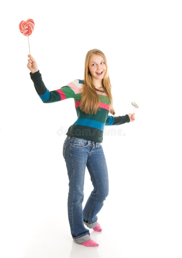 The girl with a sugar candy isolated on a white