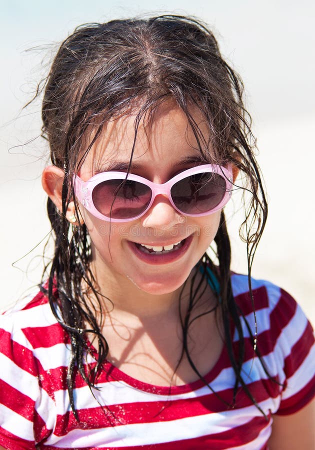 Pretty Teenage Girl In Sunglasses Striking A Pose Picture. Image 991934