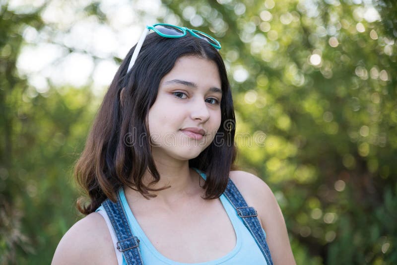 Girl With Sunglasses On Her Head Posing In Nature Stock Image Image 