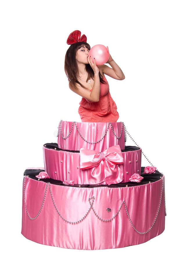 Girl, a surprise gift, jumps out of the toy cake