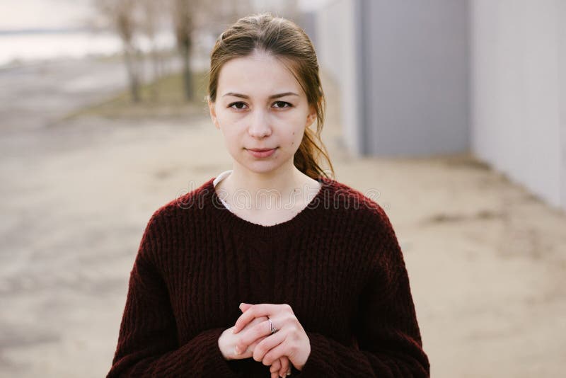 Girl in a sweater stock photo. Image of sight, street 90310948