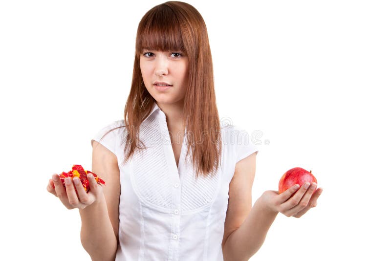 The girl with sweets and an apple