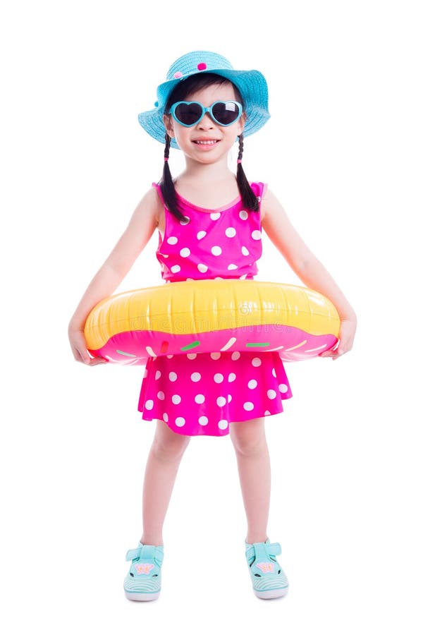 Little asian girl in swim suit smiling over white background