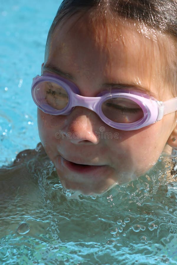 Girl swimming in the pool