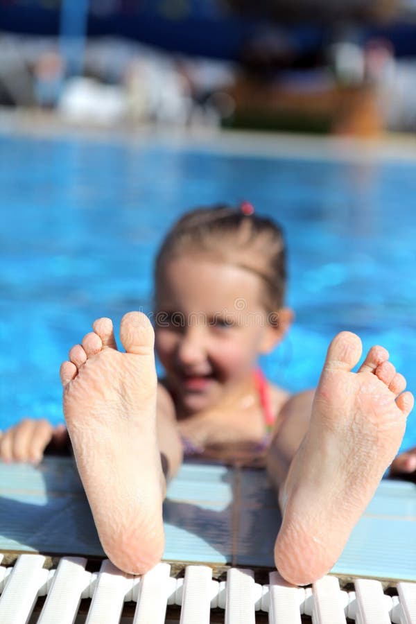 Girl swimming in the pool for a long time