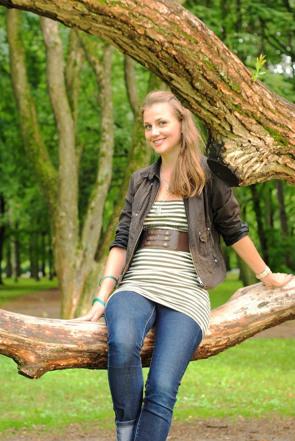 Girl swimming on a tree