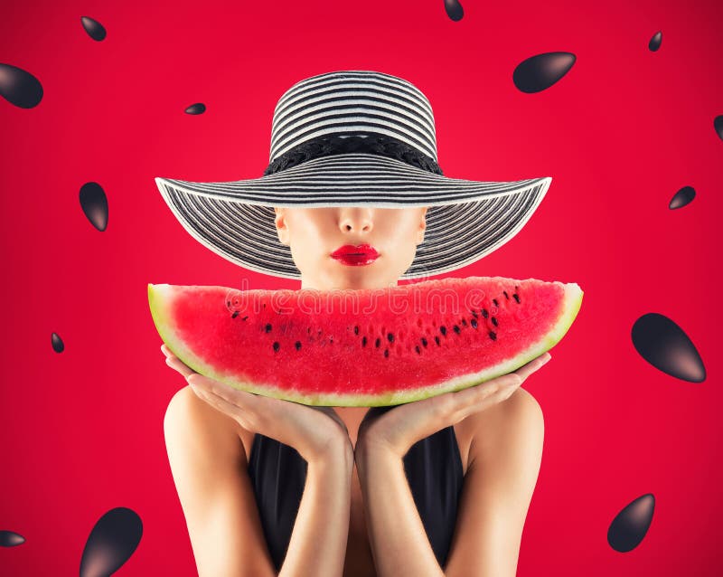 Girl in swimsuit with watermelon in hand and red background with seeds royalty free stock images Girl in swimsuit with watermelon in hand and red background with seeds royalty free stock images