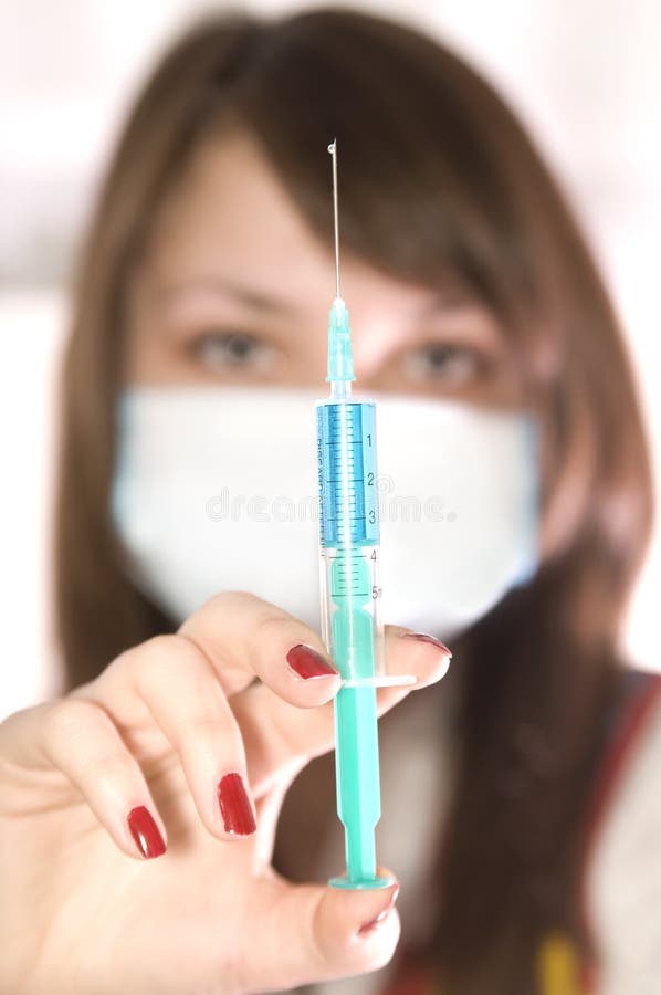 Girl with syringe stock photo. Image of needle, doctor 8726034