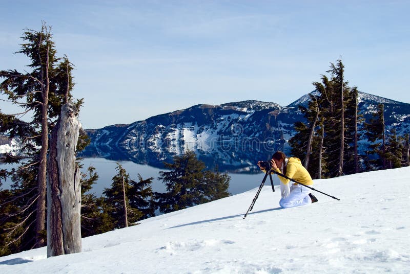 Girl taking picture at Crater Lake, Oregon