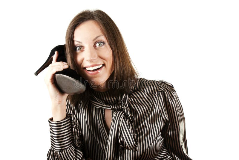 Girl talking on phone in the form of shoe