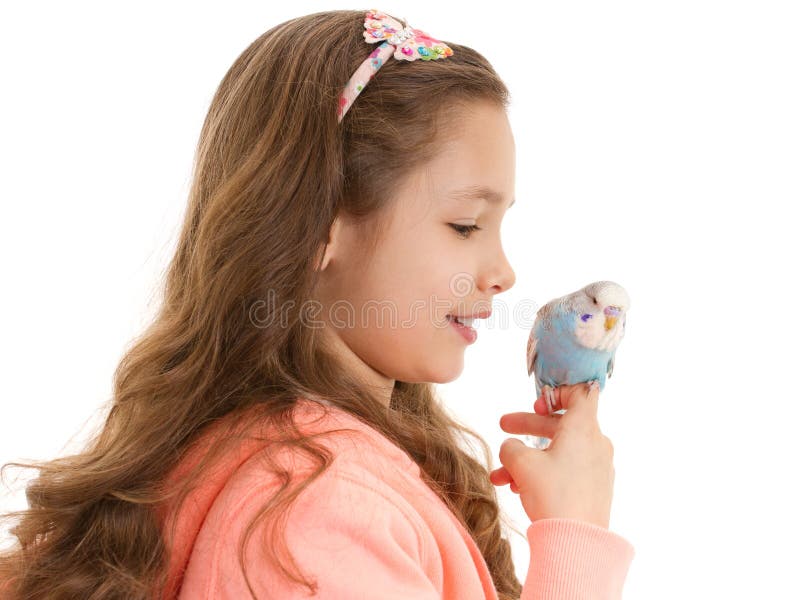 Girl with tame pet bird budgerigar