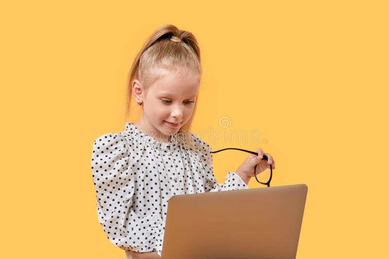 the-girl-is-taught-at-home-online-using-a-laptop-stock-photo-image