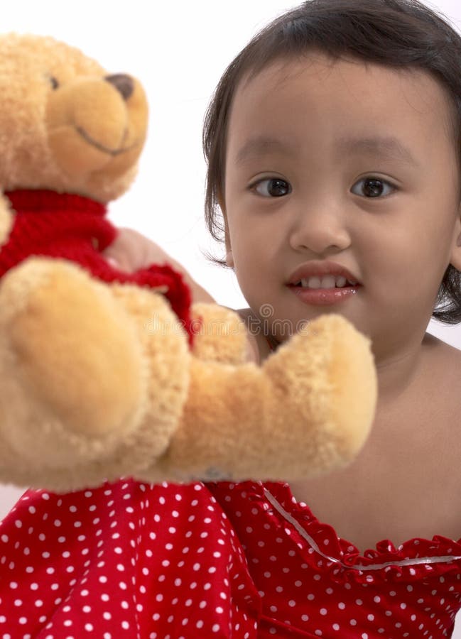 Girl with teddy bear