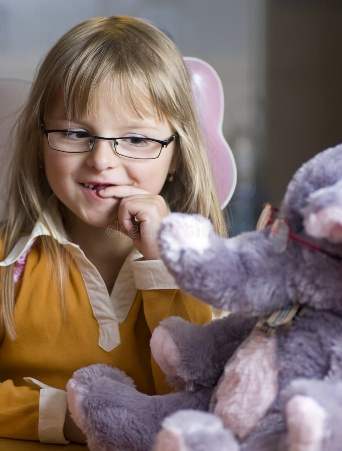 Girl and teddy bear