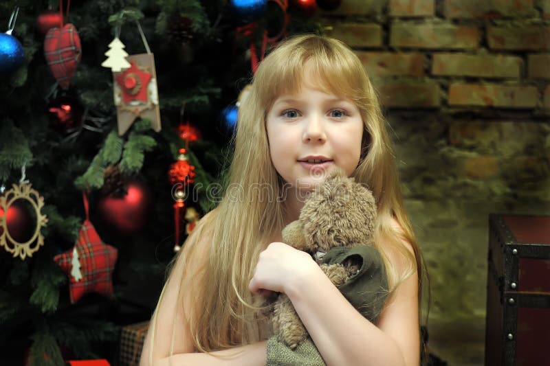 girl holding teddy bears hand girl holding teddy bears hand