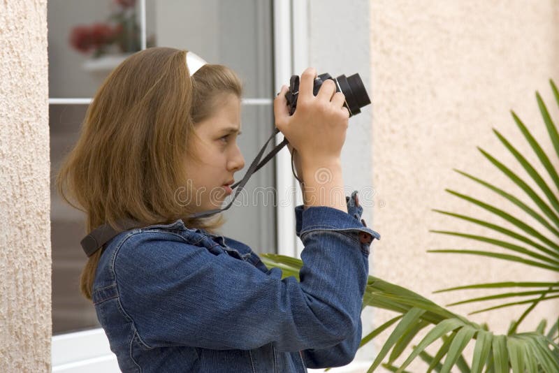 Girl-teenager with the camera