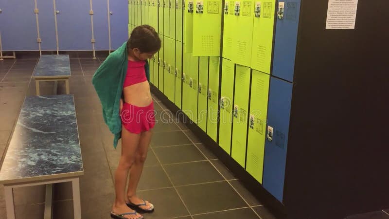 Girl Teenager in the Locker Room Wipes Himself with a Towel. Booths for Changing Clothes after Slow Motion Video the Stock Footage - Video of lifestyle, video: 100042132