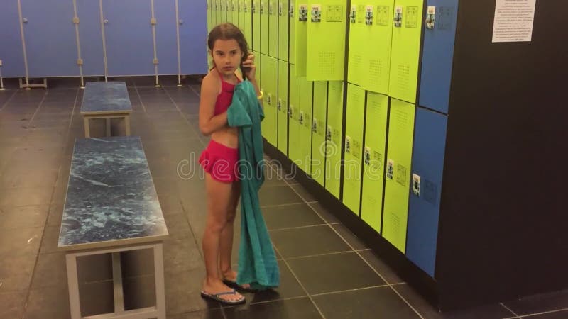 Girl Teenager in the Locker Room Wipes Himself with a Towel. Booths Slow Motion Video for Changing Clothes after the Stock Video - Video of sport, booth: 99851159