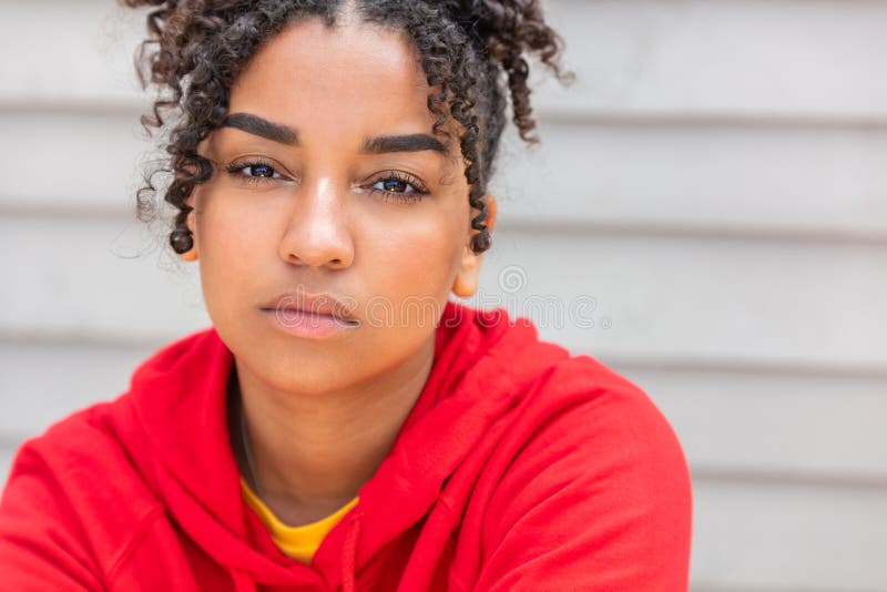 Girl teenager teen female young African American woman wearing red hoodie