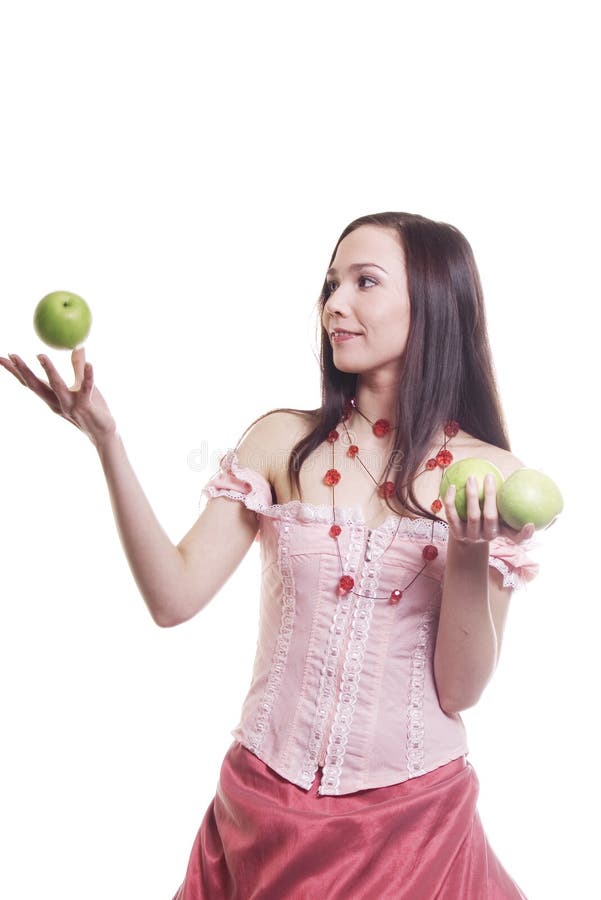 Girl with three green apples