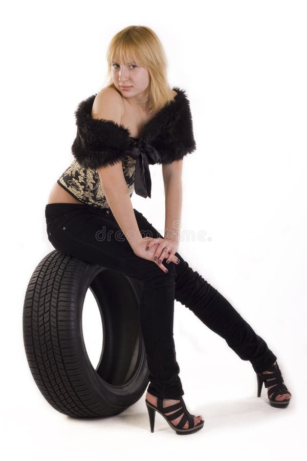Girl and tire cover stock image. Image of blond, vertical 33369313