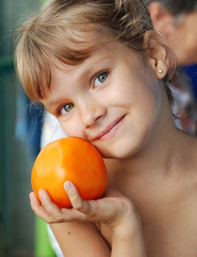 Girl with tomato